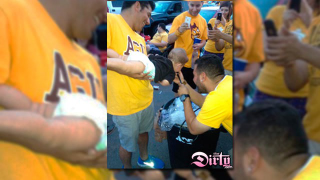Here Is A Baby Doing A Keg Stand